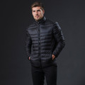Man wearing a black lightweight puffer jacket with stand collar, zip front, and horizontal quilted channels