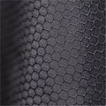 Close-up of charcoal hexagonal honeycomb weave fabric on a youth lightweight water-repellent shell jacket