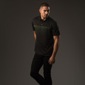 Man wearing black performance polo with lime green fading chest stripes and button placket