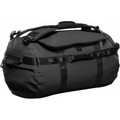 Stormtech black 42L waterproof duffle bag with reinforced webbing straps, top carry handles, and moulded zipper pulls