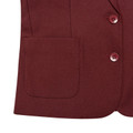 Close-up of burgundy girls school blazer showing patch pocket and tonal buttons on twill fabric