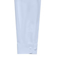 Close-up of pale blue long sleeve girls blouse cuff with two-button fastening