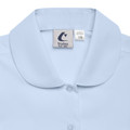 Light blue girls blouse with rounded Peter Pan collar and button placket, Trutex non-iron label visible