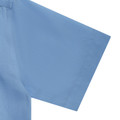 Close-up of a steel blue short sleeve school shirt showing smooth fabric texture and clean sleeve hem