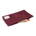 Burgundy flat zip pencil case with label patch, filled with coloured markers and crayons