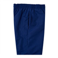 Navy blue microfibre baggy track pants with elasticated waistband and zip fly, flat lay packshot