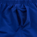 Royal blue microfibre track pants detail showing elasticated waistband and side pocket opening