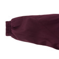 Maroon microfibre kids sports jacket sleeve detail with elasticated cuff and batwing cut