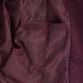 Close-up of deep burgundy microfibre jacket interior showing satin lining and inner chest pocket