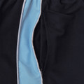 Close-up of navy microfibre sport shorts with sky blue contrast side panel, white piping, and zip pocket detail