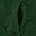 Close-up of bottle green microfibre jacket showing slash pocket with reinforced woven loop detail