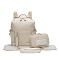 Beige nappy backpack set with matching change mat and accessory pouch featuring gold hardware and front pockets