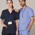 Unisex V-neck scrubs tops in charcoal and periwinkle blue with chest pockets and short sleeves