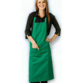 Kelly green full bib apron with front pocket worn by model over black top, smooth flat panel bib