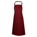 Deep burgundy full bib apron with adjustable neck strap and single front pocket, flat lay
