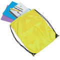 Yellow polyester drawstring backpack with black cords and metal eyelets, shown filled with stationery items