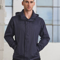 Navy jacket with concealed hood, storm flap closure, and shoulder panel detail