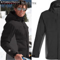 Stormtech black and charcoal 3-in-1 system jacket with adjustable hood, zip chest pocket, and contrast side panels