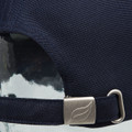 Navy recycled PET cap with contrast white underpeak and metal leaf logo buckle closure