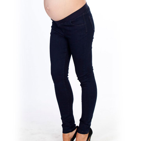 Navy maternity legging with stretch panel waistband in slim fit silhouette