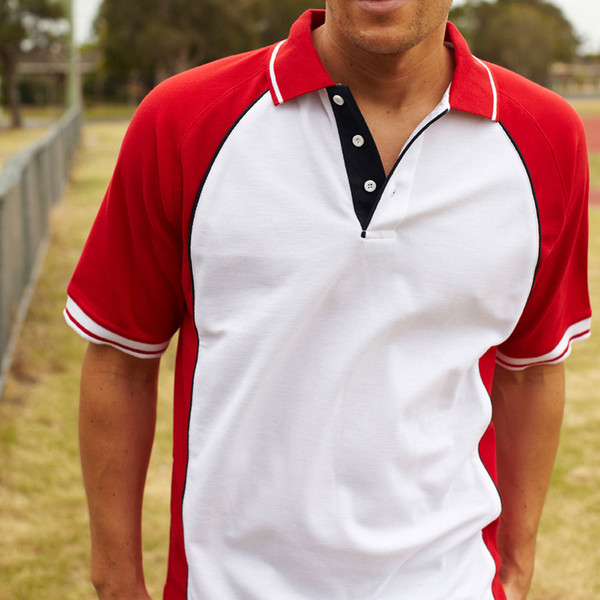 White raglan polo with red sleeves, black contrast placket and white tipping detail on collar and cuffs