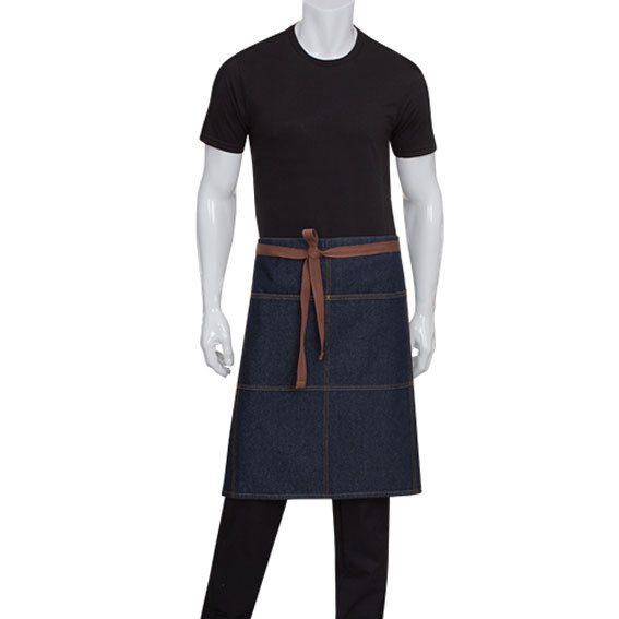 Indigo denim three-quarter waist apron with tan leather ties and contrast stitching, worn over black tee and trousers