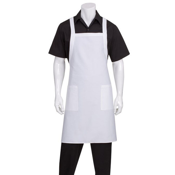 White crossover back bib apron with two front patch pockets, worn over black shirt and trousers