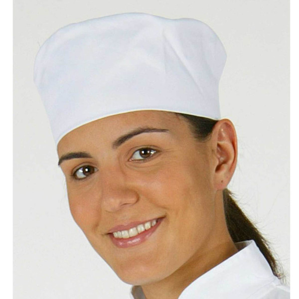 White chef beanie hat with elastic back worn by smiling chef showing rounded crown design