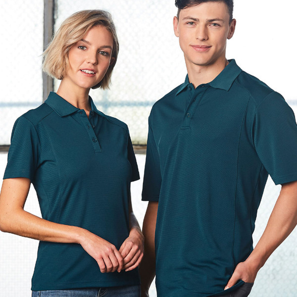 Woman wearing teal bamboo charcoal polo shirt with collar and button placket, styled with man in matching polo