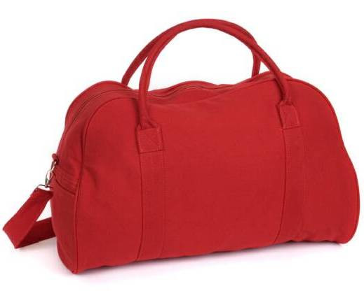 Bright red canvas duffel bag with dual carry handles and adjustable shoulder strap