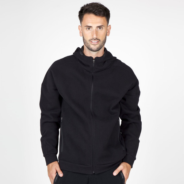 Black zip-up hoodie jacket with high funnel neck collar and front pockets worn on model
