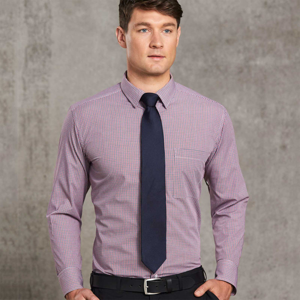 Man wearing a red and blue mini gingham check long sleeve shirt with button-down collar and chest pocket