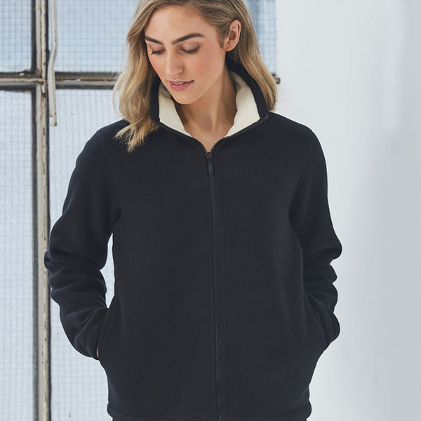 Black polar fleece jacket with contrasting white sherpa collar and full zip front