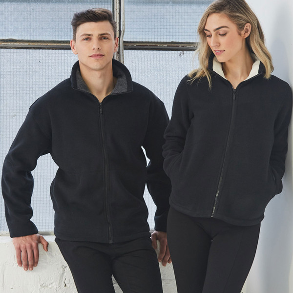 Black polar fleece jacket with full zip and grey contrast hood lining on male model