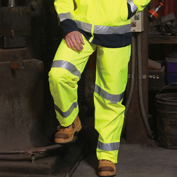 Hi-vis safety pants in fluorescent yellow with 3M reflective tape and navy contrast panels on legs