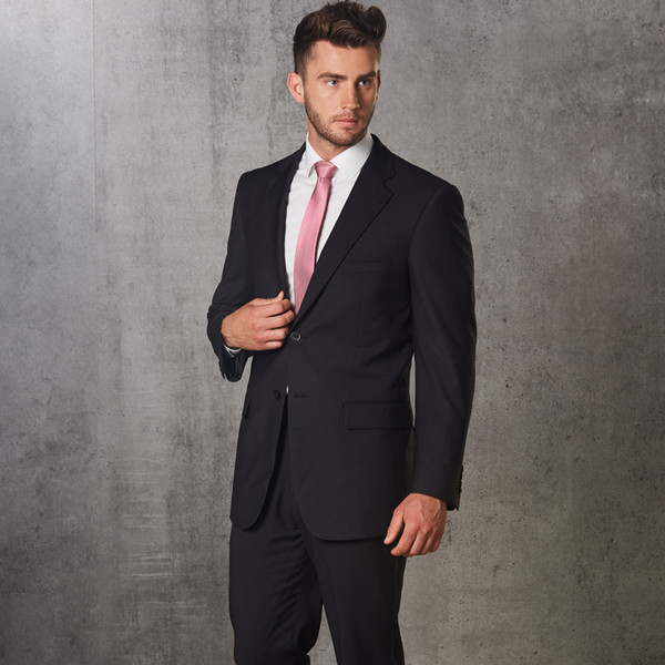 Black stretch corporate jacket with notch lapels and two-button closure, worn with white shirt and pink tie