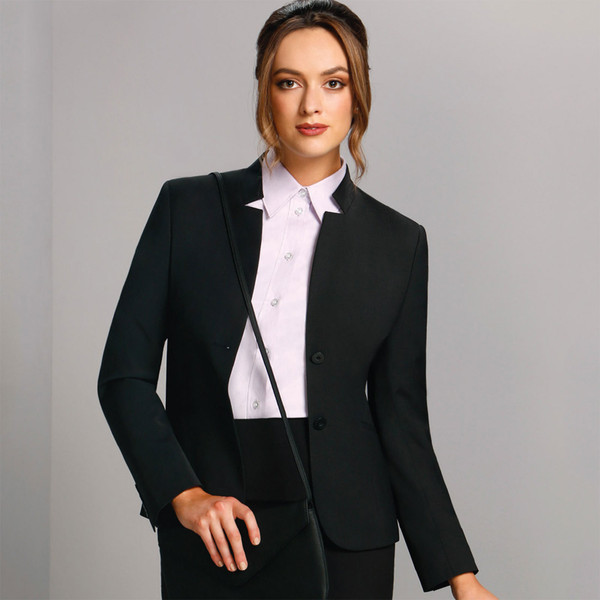 Black wool blend stretch blazer with notch lapels worn over white collared shirt