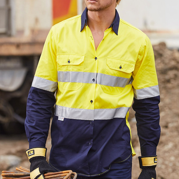 High visibility work shirt in safety yellow and navy with silver reflective tape and chest pockets