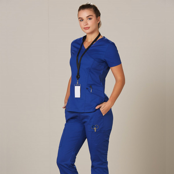Royal blue short sleeve scrub top with navy contrast trim and practical pockets ideal for decoration