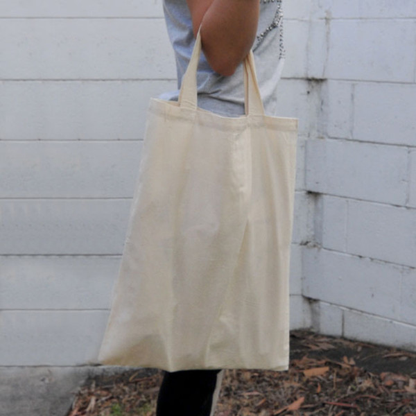 Natural calico tote bag with long handles and spacious flat panel for decoration