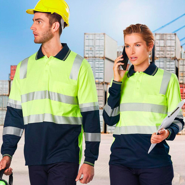Male and female workers in fluoro yellow and navy long sleeve hi-vis polo with segmented reflective tape, on job site