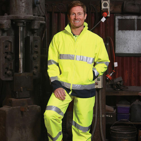 Hi-vis yellow softshell jacket with navy contrast panels and horizontal 3M reflective tape across chest and arms