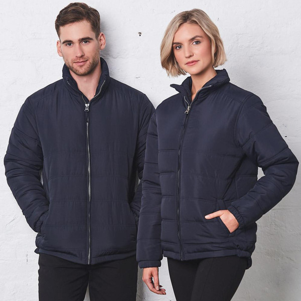 Navy quilted puffer jackets with full front zippers and stand collars, shown on male and female models