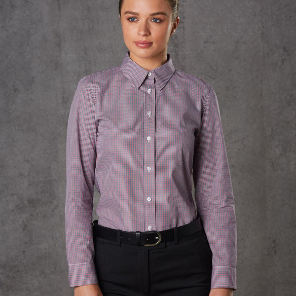 Woman wearing a burgundy and white mini gingham long sleeve shirt with button-down collar and button front