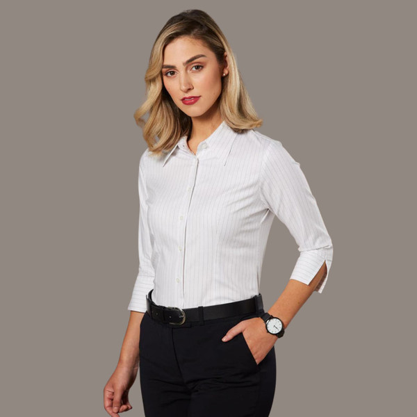 White pinstripe women's shirt with three-quarter sleeves, collar and button-front closure paired with black trousers