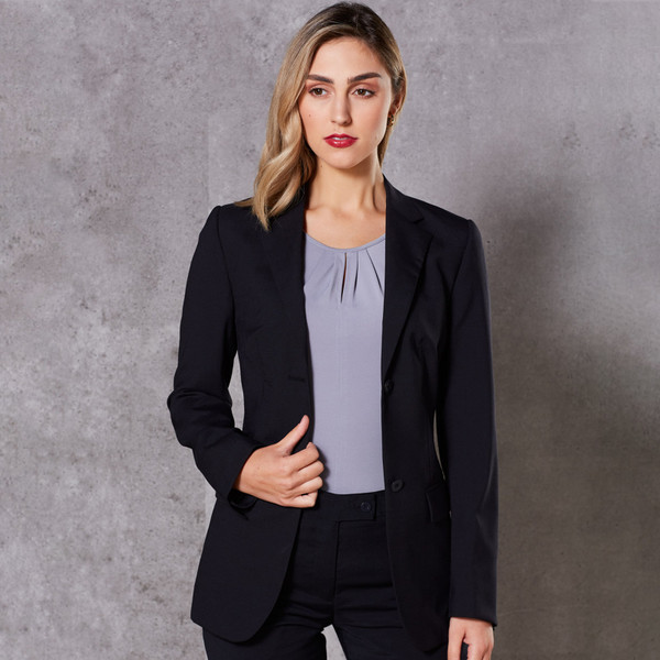 Black wool blend mid-length jacket with notch lapels and single button closure, worn over lavender top