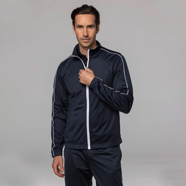 Man wearing navy full-zip sports jacket with white contrast piping on shoulders and sleeves