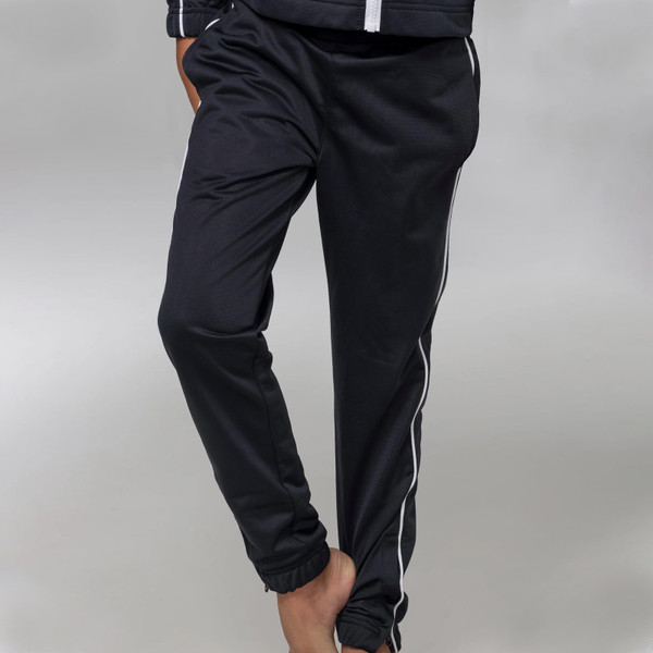 Black tracksuit pants with white contrast piping detail along sides and elasticated cuffs