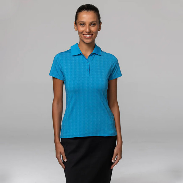 Bright turquoise polo shirt with tonal jacquard pattern and short sleeves on model