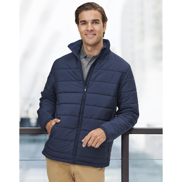 Navy quilted puffer jacket with horizontal paneling and full zip front, worn over grey shirt